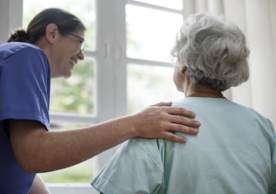nurse-taking-care-old-woman