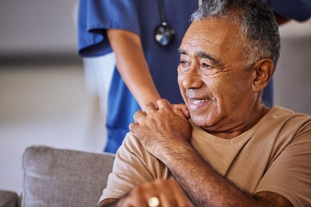 man with caregiver