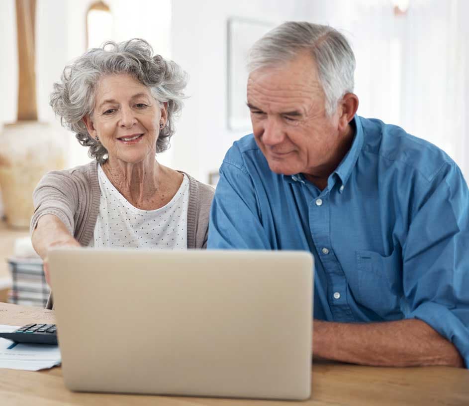 A couple looking at a computer